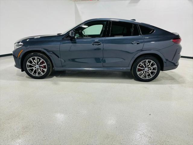 used 2022 BMW X6 car, priced at $52,998