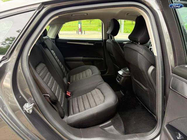 used 2016 Ford Fusion car, priced at $8,999