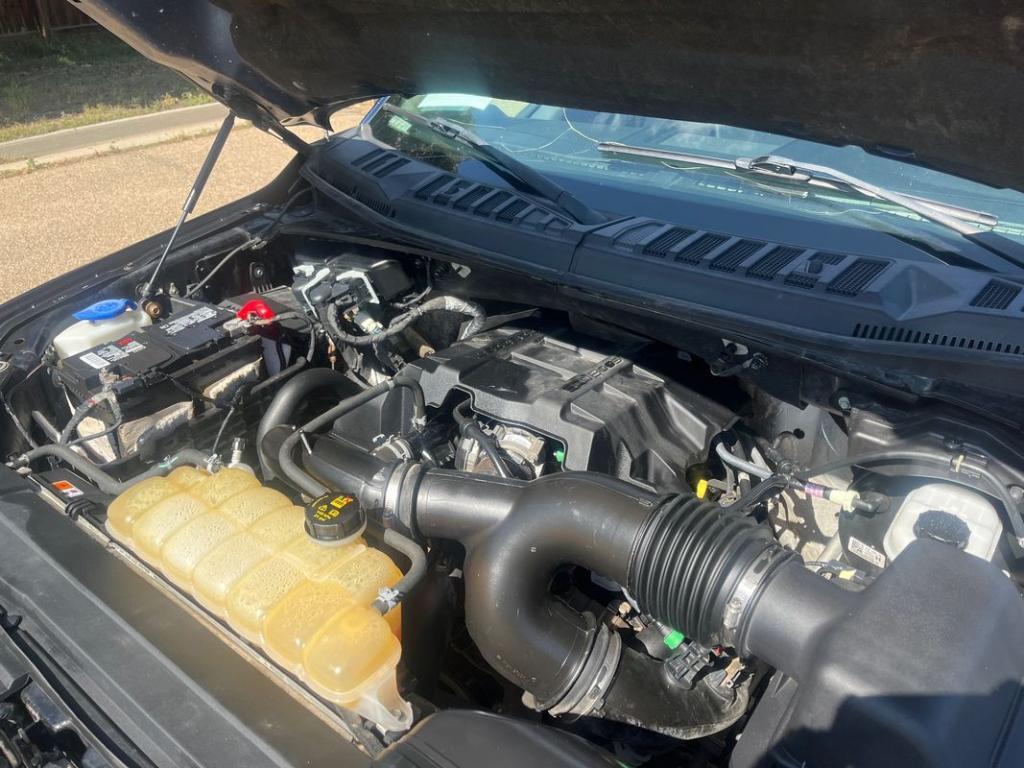 used 2018 Ford F-150 car, priced at $14,999