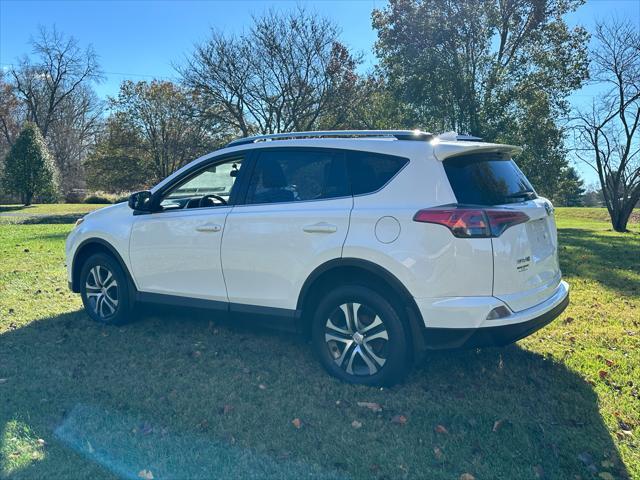 used 2016 Toyota RAV4 car, priced at $14,995