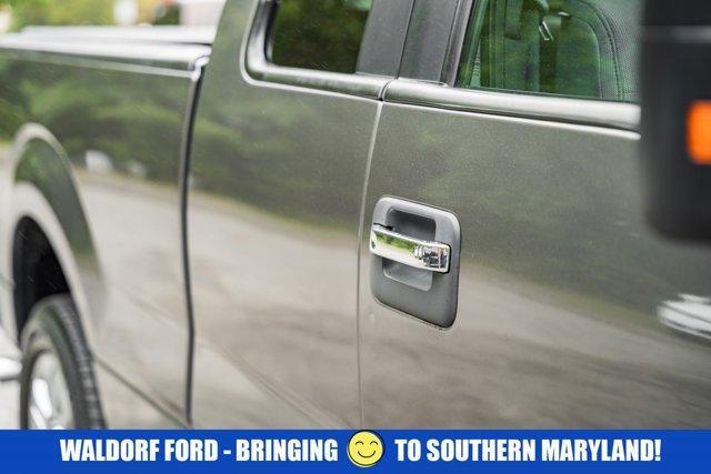 used 2014 Ford F-150 car, priced at $14,000