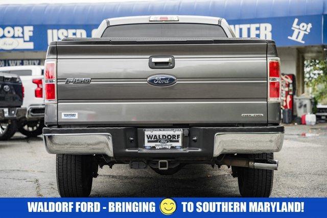 used 2014 Ford F-150 car, priced at $14,000