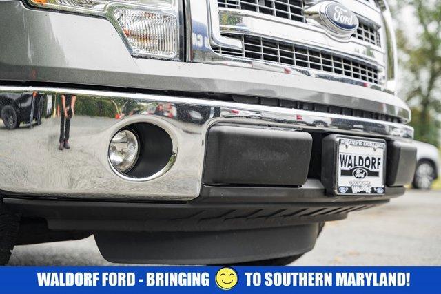 used 2014 Ford F-150 car, priced at $14,000