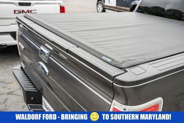 used 2014 Ford F-150 car, priced at $14,000