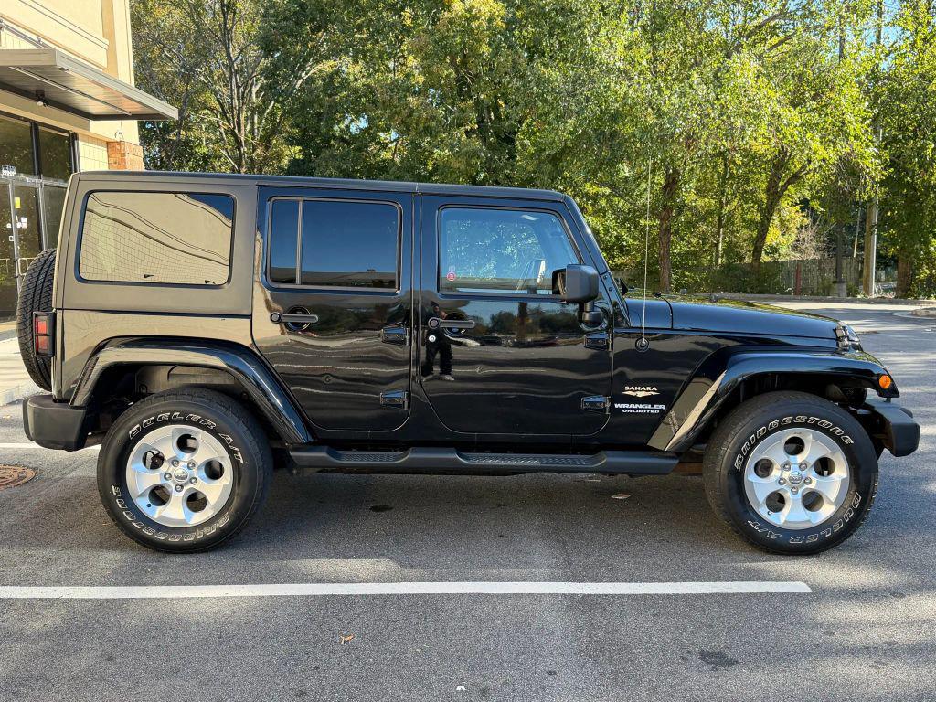 used 2014 Jeep Wrangler Unlimited car, priced at $18,999
