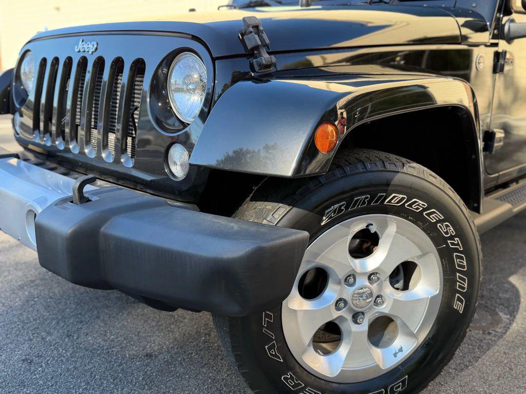 used 2014 Jeep Wrangler Unlimited car, priced at $18,999