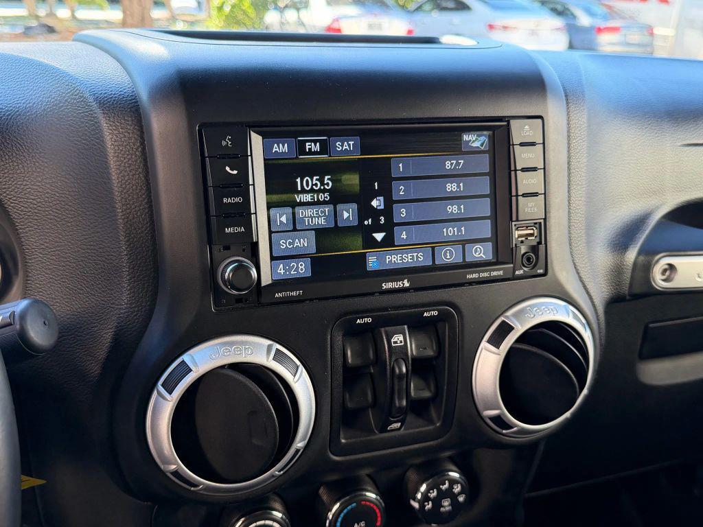 used 2014 Jeep Wrangler Unlimited car, priced at $18,999