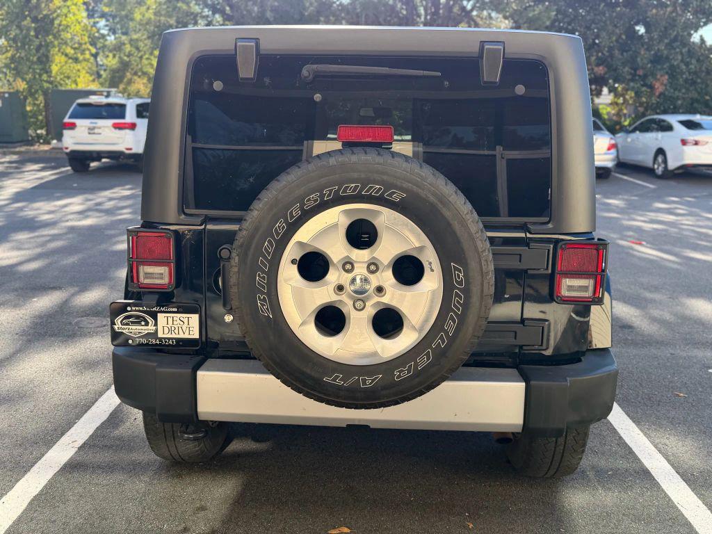 used 2014 Jeep Wrangler Unlimited car, priced at $18,999