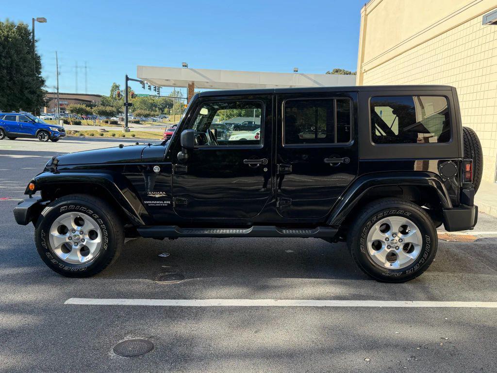 used 2014 Jeep Wrangler Unlimited car, priced at $18,999