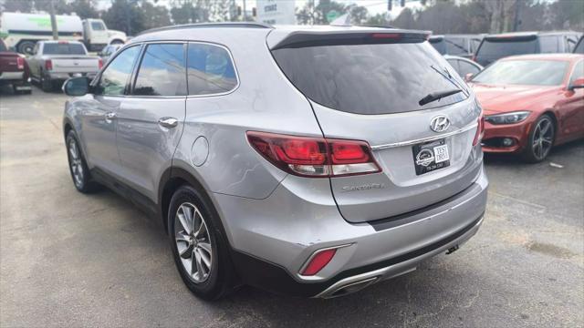 used 2018 Hyundai Santa Fe car, priced at $15,999