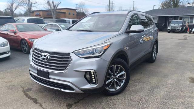 used 2018 Hyundai Santa Fe car, priced at $15,999