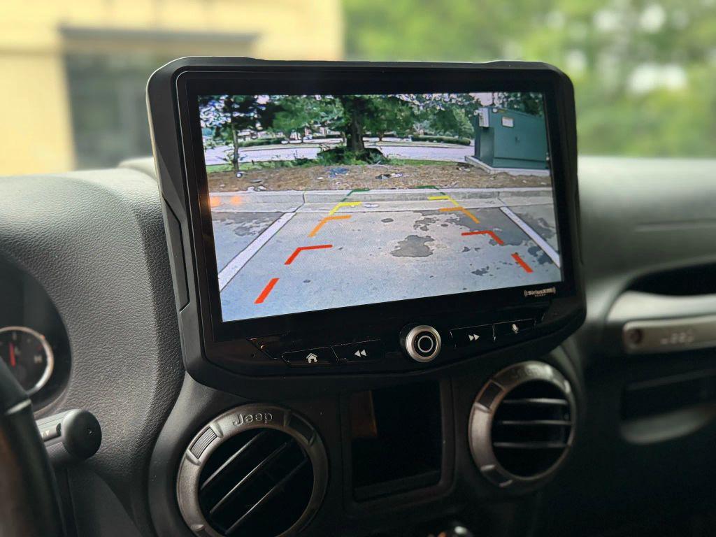 used 2018 Jeep Wrangler JK Unlimited car, priced at $21,999