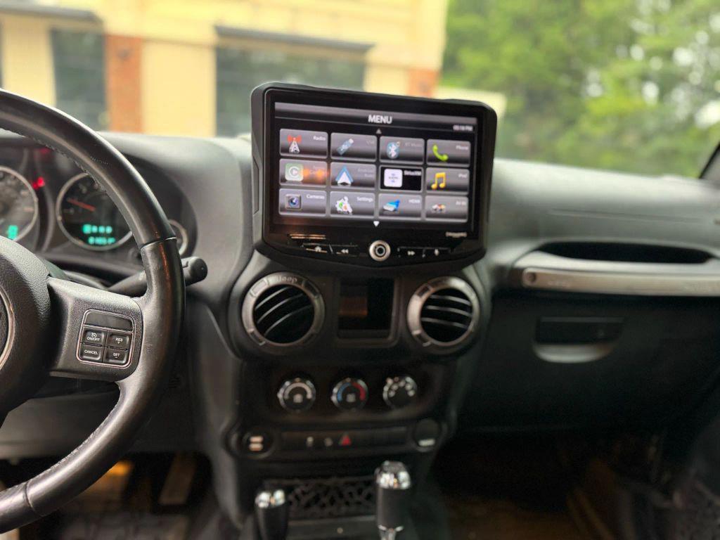 used 2018 Jeep Wrangler JK Unlimited car, priced at $21,999