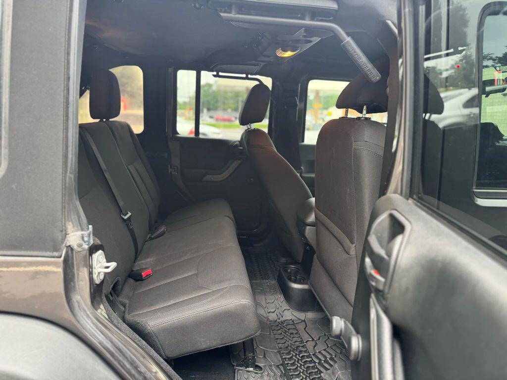 used 2018 Jeep Wrangler JK Unlimited car, priced at $21,999