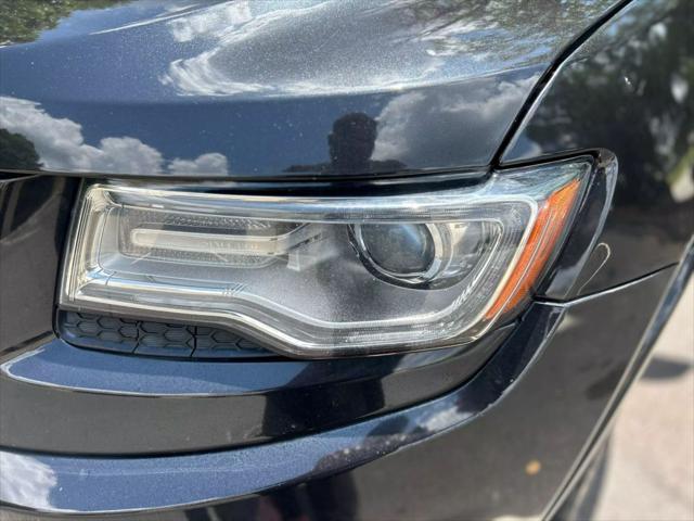used 2014 Jeep Grand Cherokee car, priced at $13,999