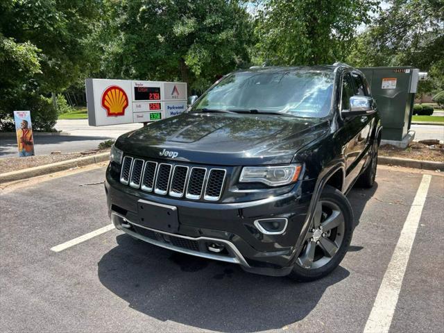 used 2014 Jeep Grand Cherokee car, priced at $13,999
