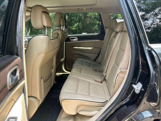 used 2014 Jeep Grand Cherokee car, priced at $13,999