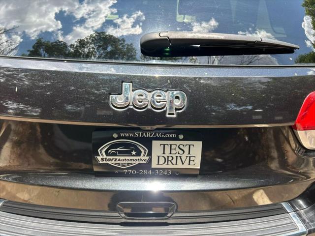 used 2014 Jeep Grand Cherokee car, priced at $13,999