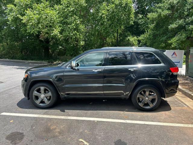 used 2014 Jeep Grand Cherokee car, priced at $13,999