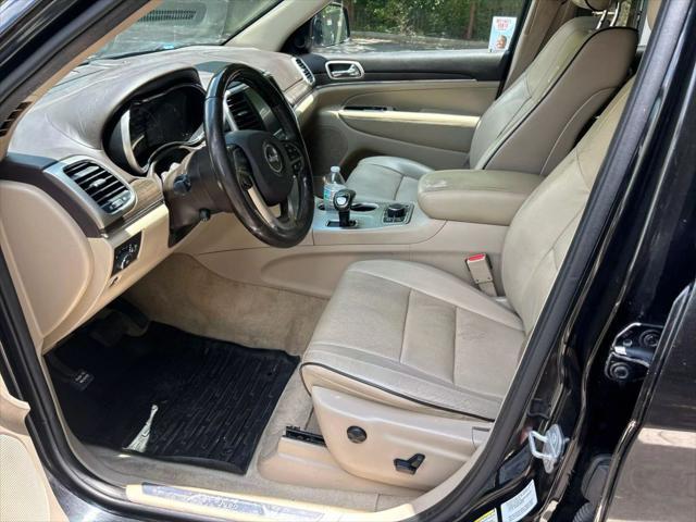 used 2014 Jeep Grand Cherokee car, priced at $13,999