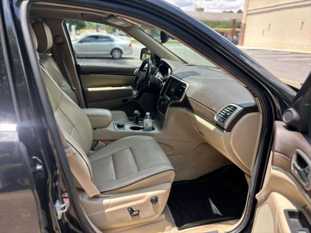 used 2014 Jeep Grand Cherokee car, priced at $13,999