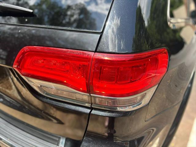 used 2014 Jeep Grand Cherokee car, priced at $13,999