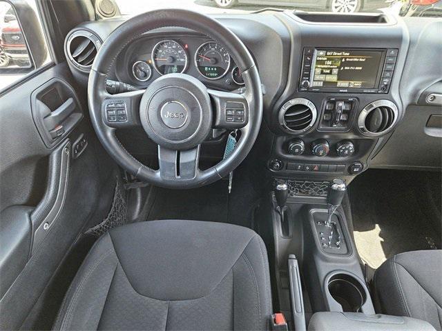 used 2014 Jeep Wrangler Unlimited car, priced at $14,990