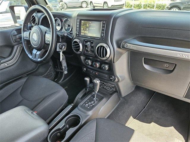 used 2014 Jeep Wrangler Unlimited car, priced at $14,990