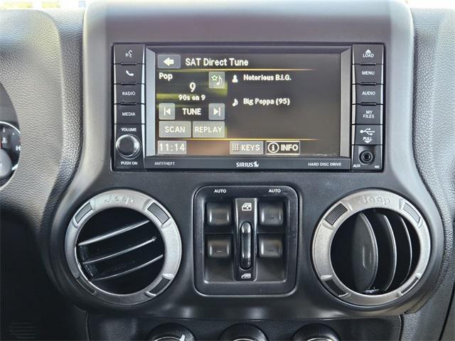 used 2014 Jeep Wrangler Unlimited car, priced at $14,990