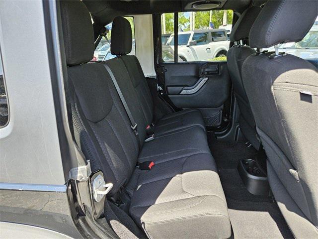 used 2014 Jeep Wrangler Unlimited car, priced at $14,990