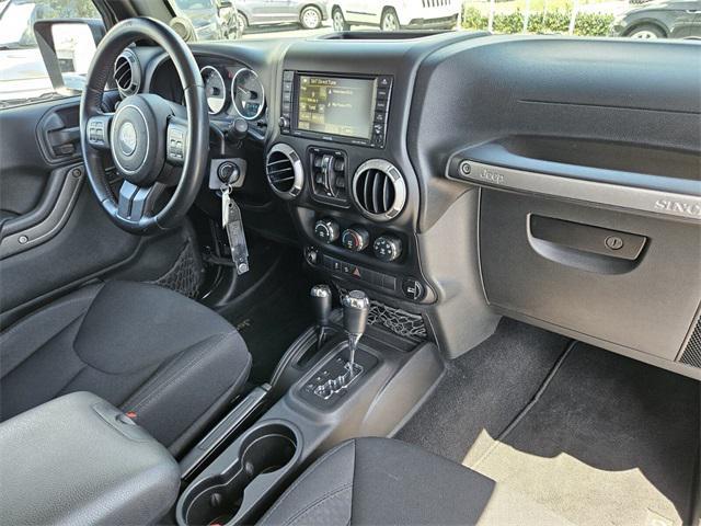 used 2014 Jeep Wrangler Unlimited car, priced at $14,990