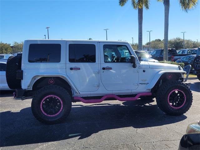 used 2012 Jeep Wrangler Unlimited car, priced at $14,790