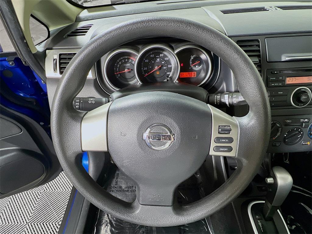 used 2012 Nissan Versa car, priced at $6,900
