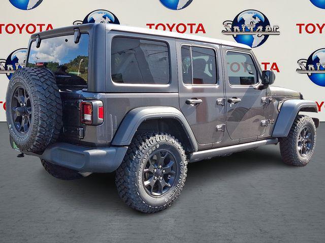 used 2021 Jeep Wrangler Unlimited car, priced at $31,893