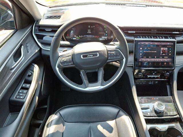 used 2023 Jeep Grand Cherokee 4xe car, priced at $28,494