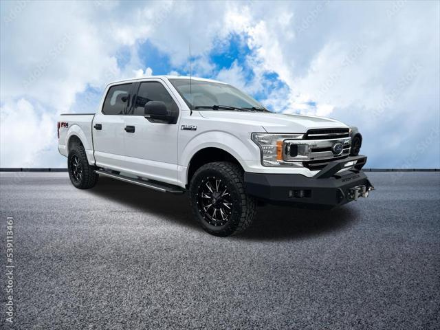 used 2018 Ford F-150 car, priced at $23,099