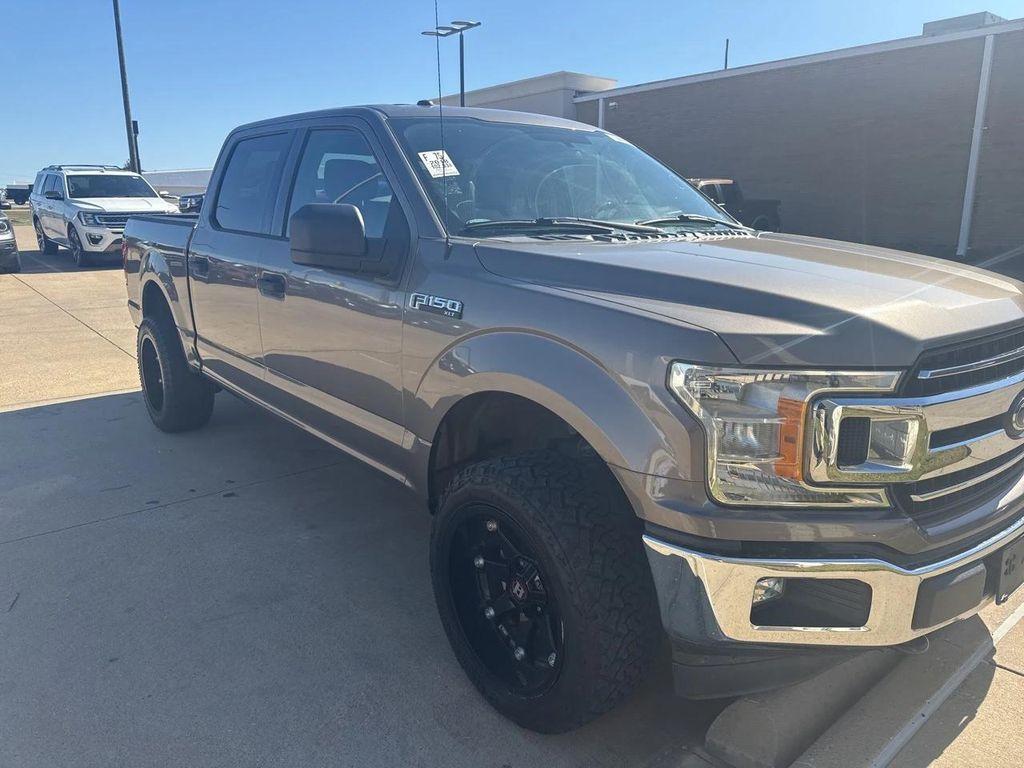 used 2018 Ford F-150 car, priced at $21,765