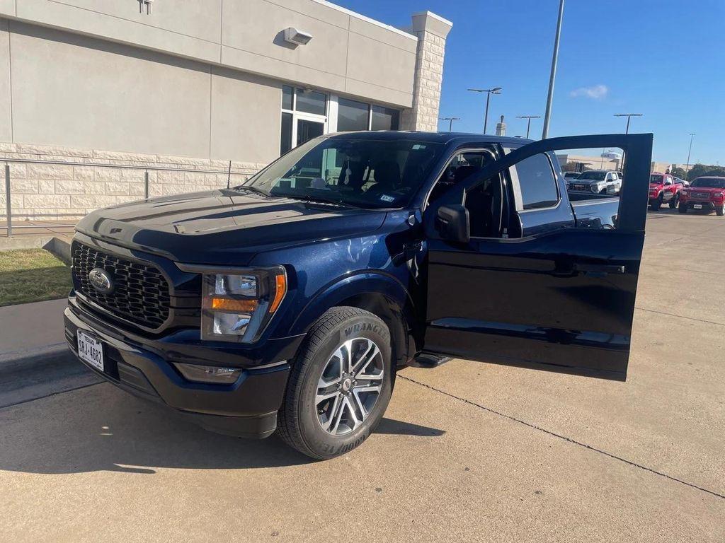 used 2023 Ford F-150 car, priced at $31,017