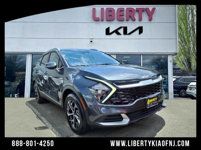 used 2023 Kia Sportage Hybrid car, priced at $27,452