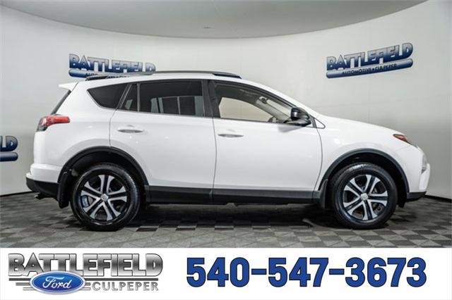 used 2018 Toyota RAV4 car, priced at $15,998
