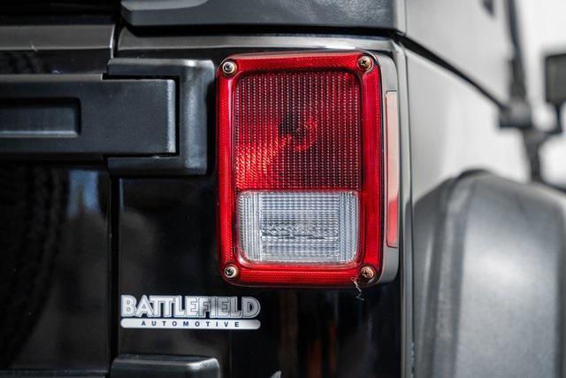 used 2015 Jeep Wrangler Unlimited car, priced at $15,900