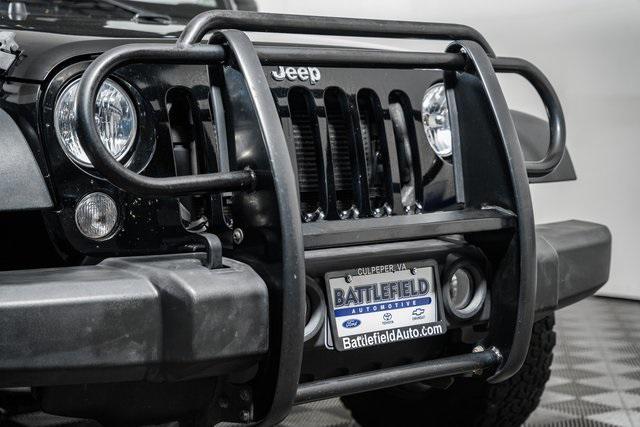 used 2015 Jeep Wrangler Unlimited car, priced at $15,900