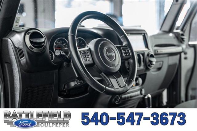 used 2016 Jeep Wrangler car, priced at $13,998
