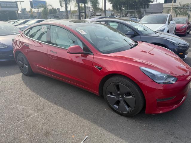 used 2022 Tesla Model 3 car, priced at $21,999