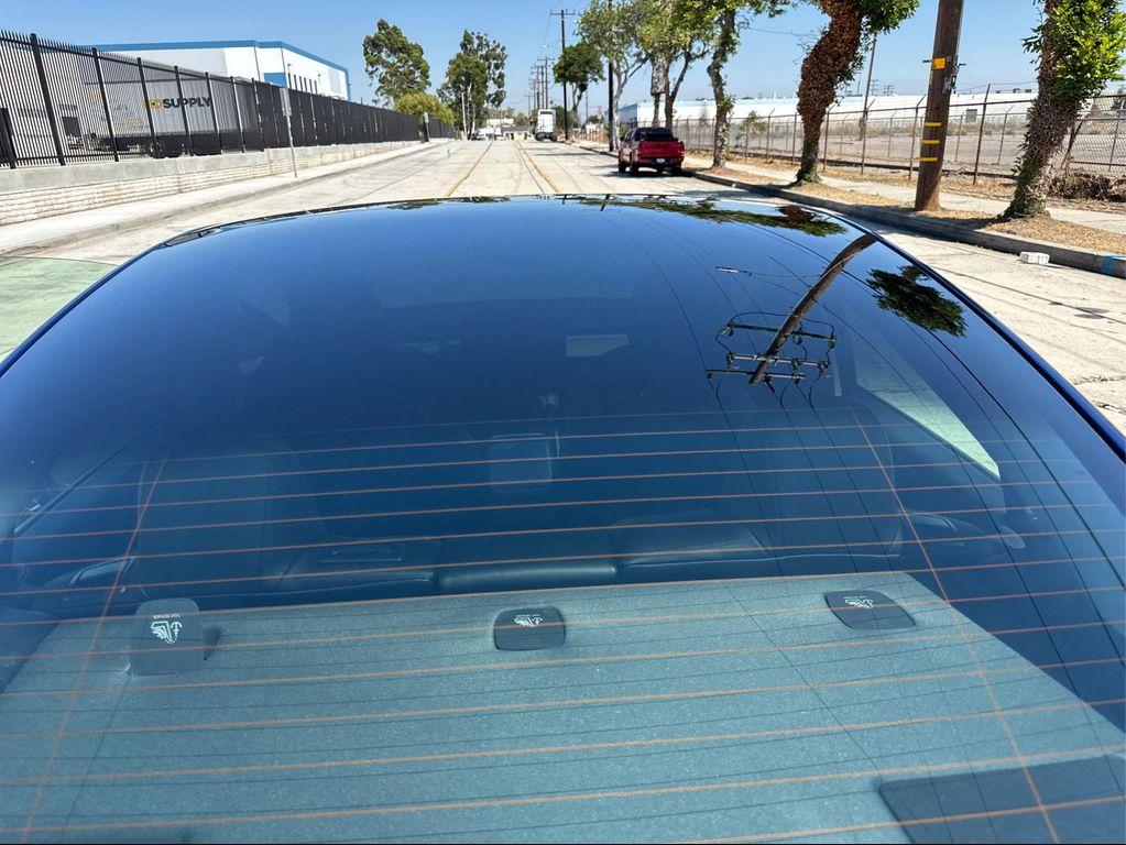 used 2022 Tesla Model 3 car, priced at $21,634