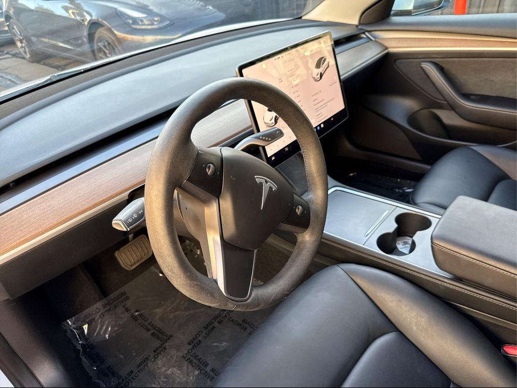 used 2023 Tesla Model 3 car, priced at $22,741