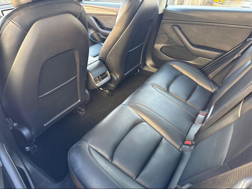 used 2023 Tesla Model 3 car, priced at $22,741