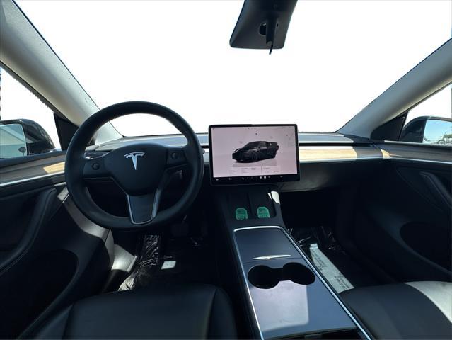 used 2023 Tesla Model Y car, priced at $29,609