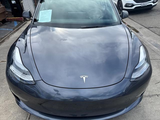 used 2022 Tesla Model 3 car, priced at $25,999