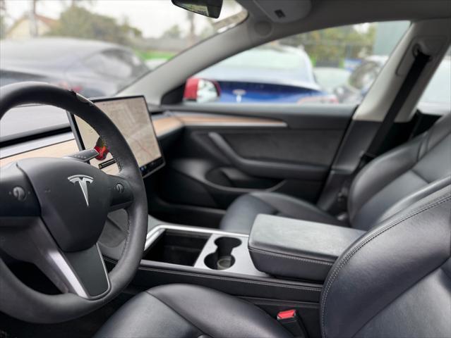 used 2022 Tesla Model 3 car, priced at $20,975